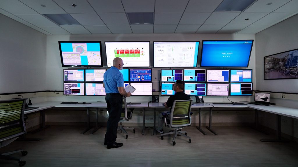 Wall of computer screens to plan patient's treatment