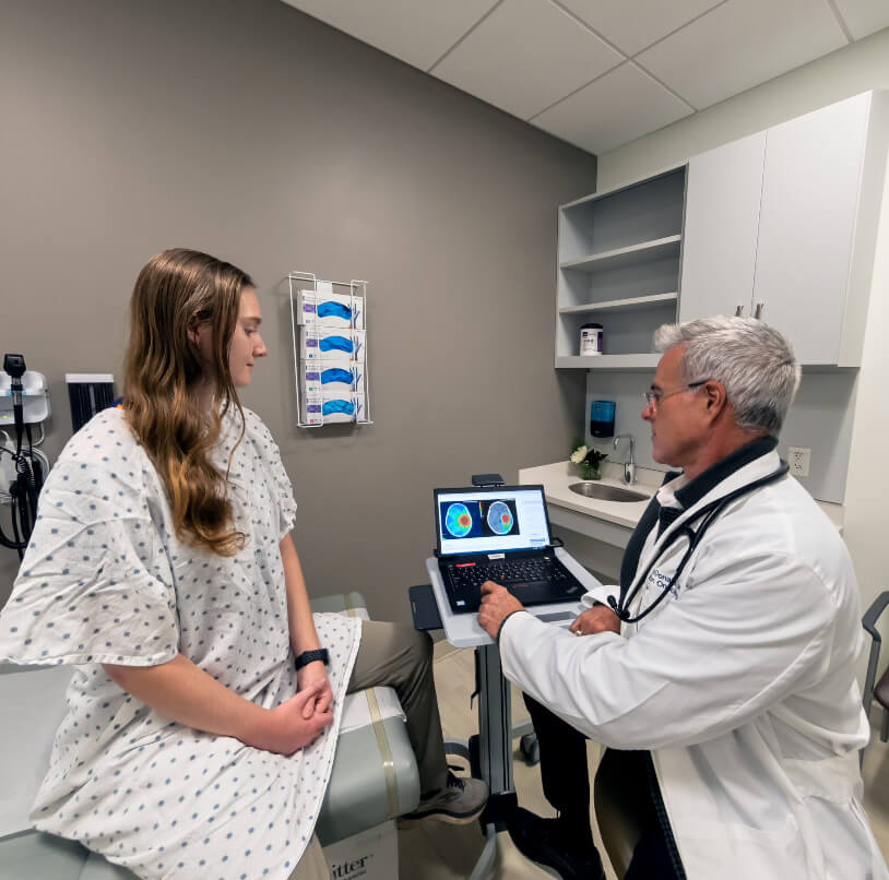 Male doctor with female patient